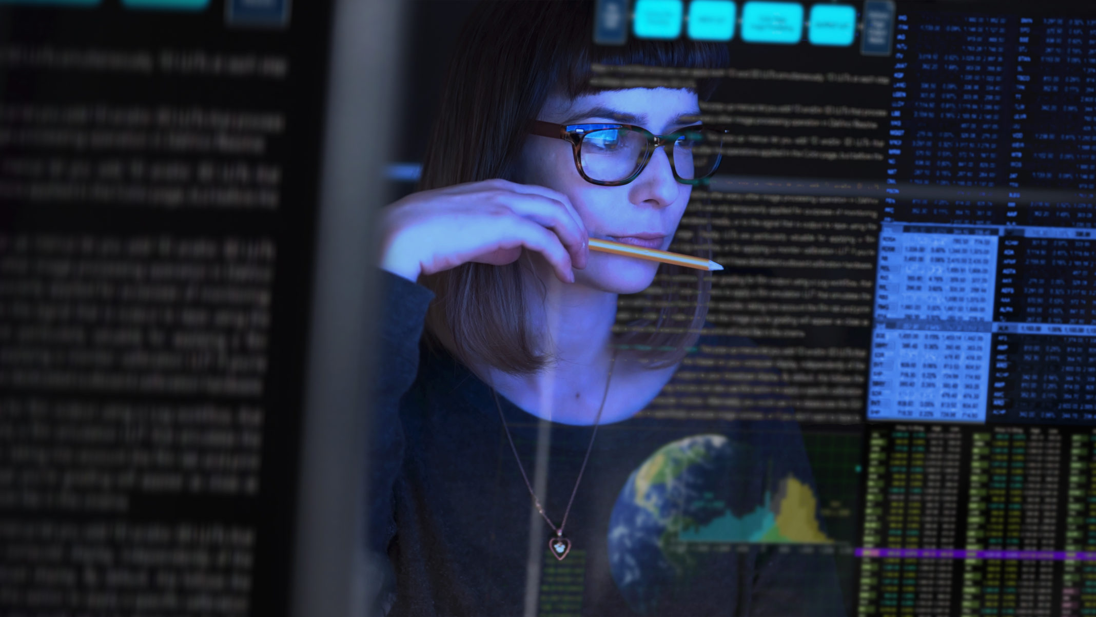 Woman looking at information on a computer -
Digital Manufacturing Focus