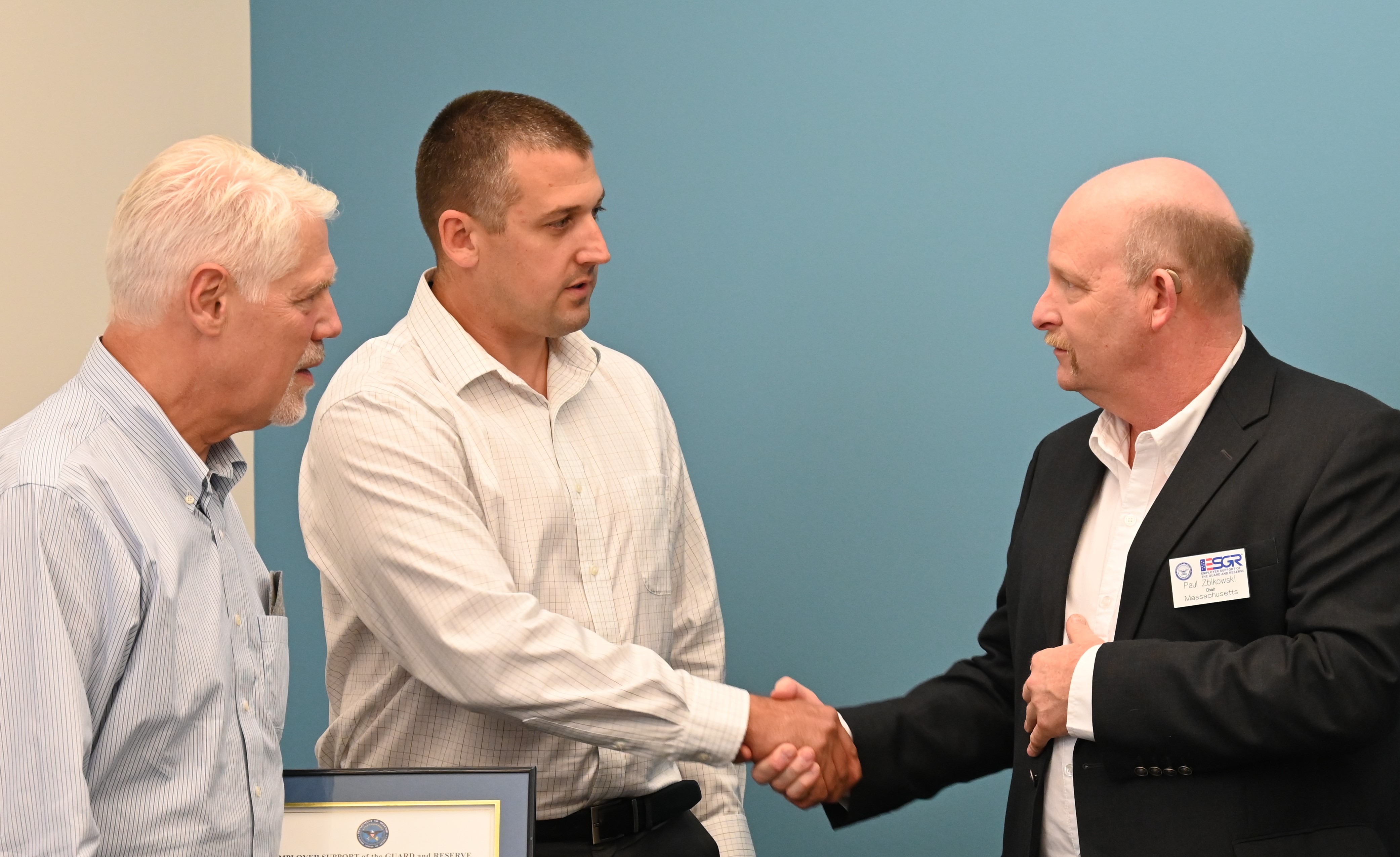 ESGR State Chairman Paul Zbikowski thanks Safety Leader Joel Simpson for his service, as President Tom Ramundo accepts his awards. 