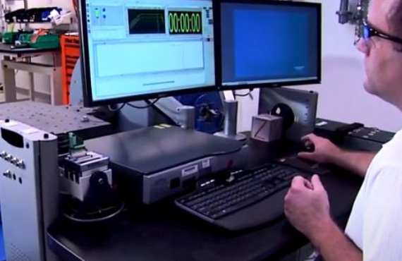 technician looking at readout on computer screen, valve inspection, valve services